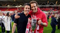 Wrexham owners Reynolds and Mac buy football pub