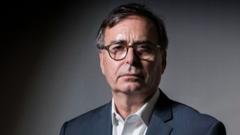 Football regulator says he would quit over Man City political interference
